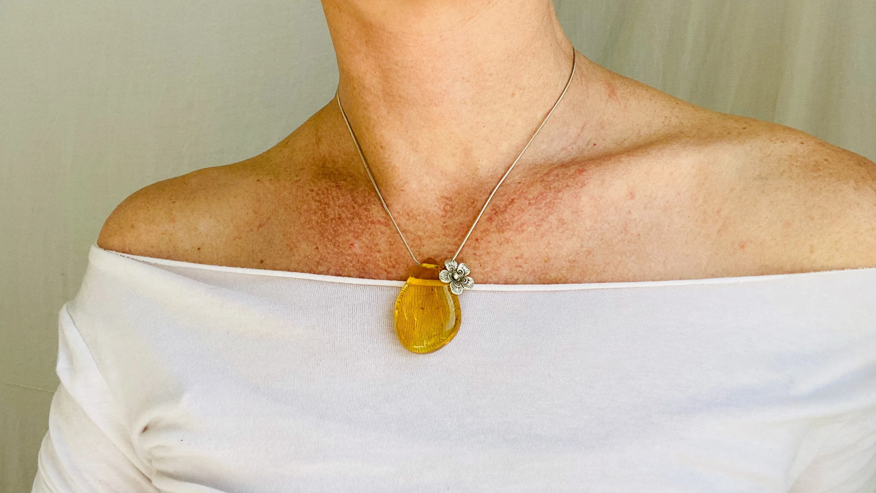 Amber Flower Pendant on a Silver Chain. Snake Chain. Atelier Aadya. 0188