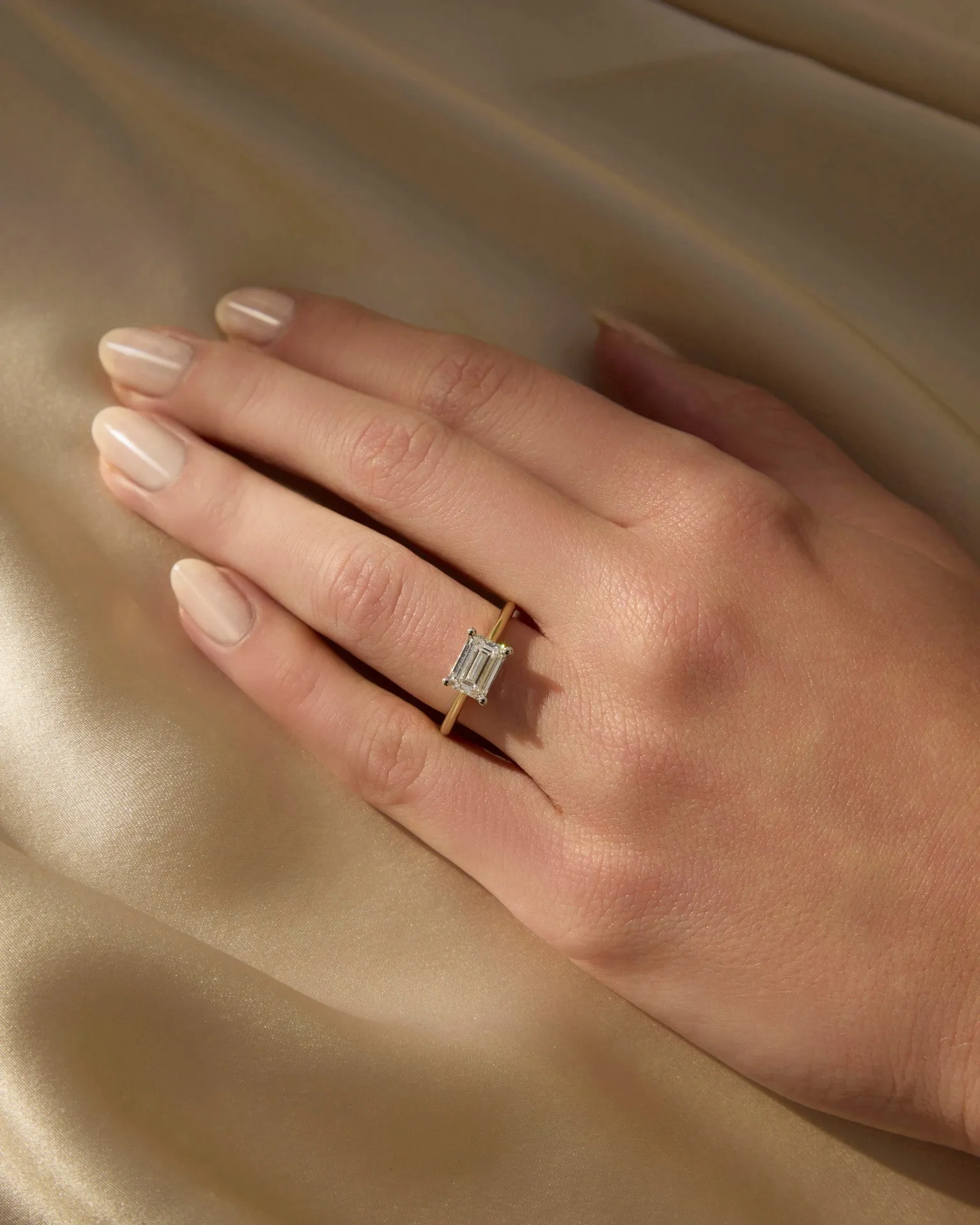 Astrid | Emerald Cut Solitaire Diamond Engagement Ring | East West