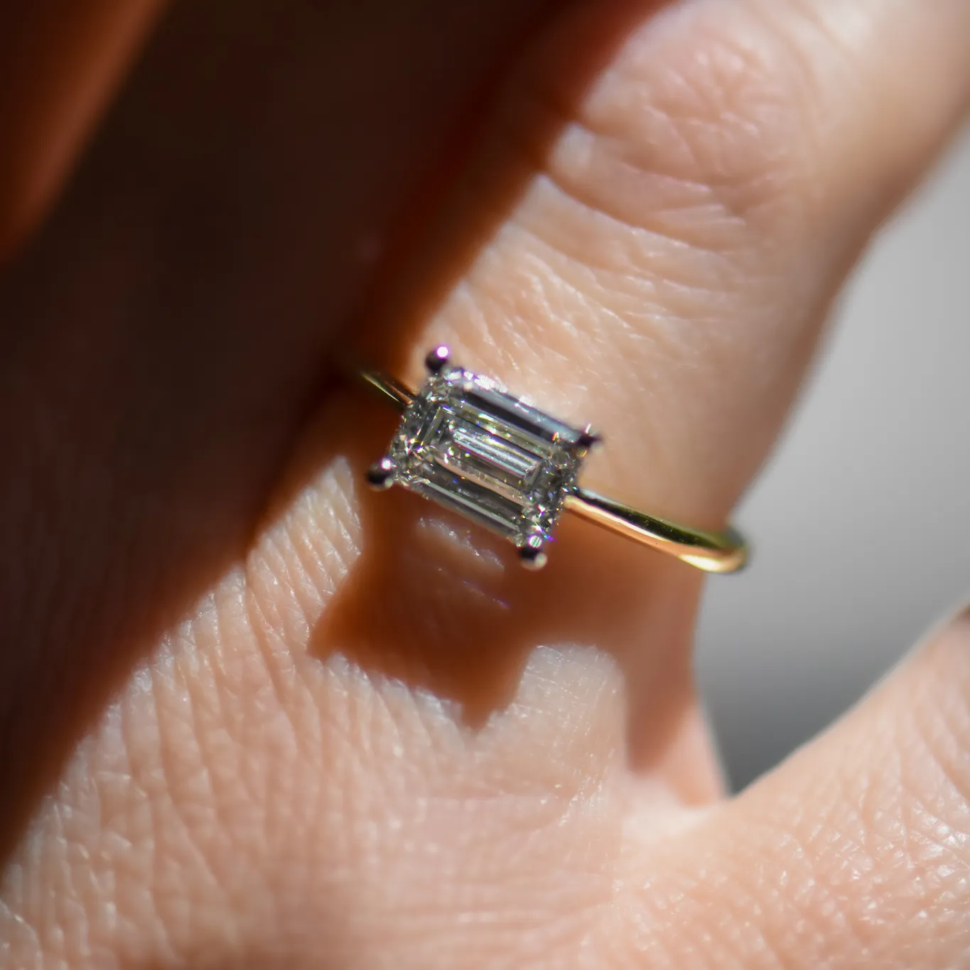 Astrid | Emerald Cut Solitaire Diamond Engagement Ring | East West