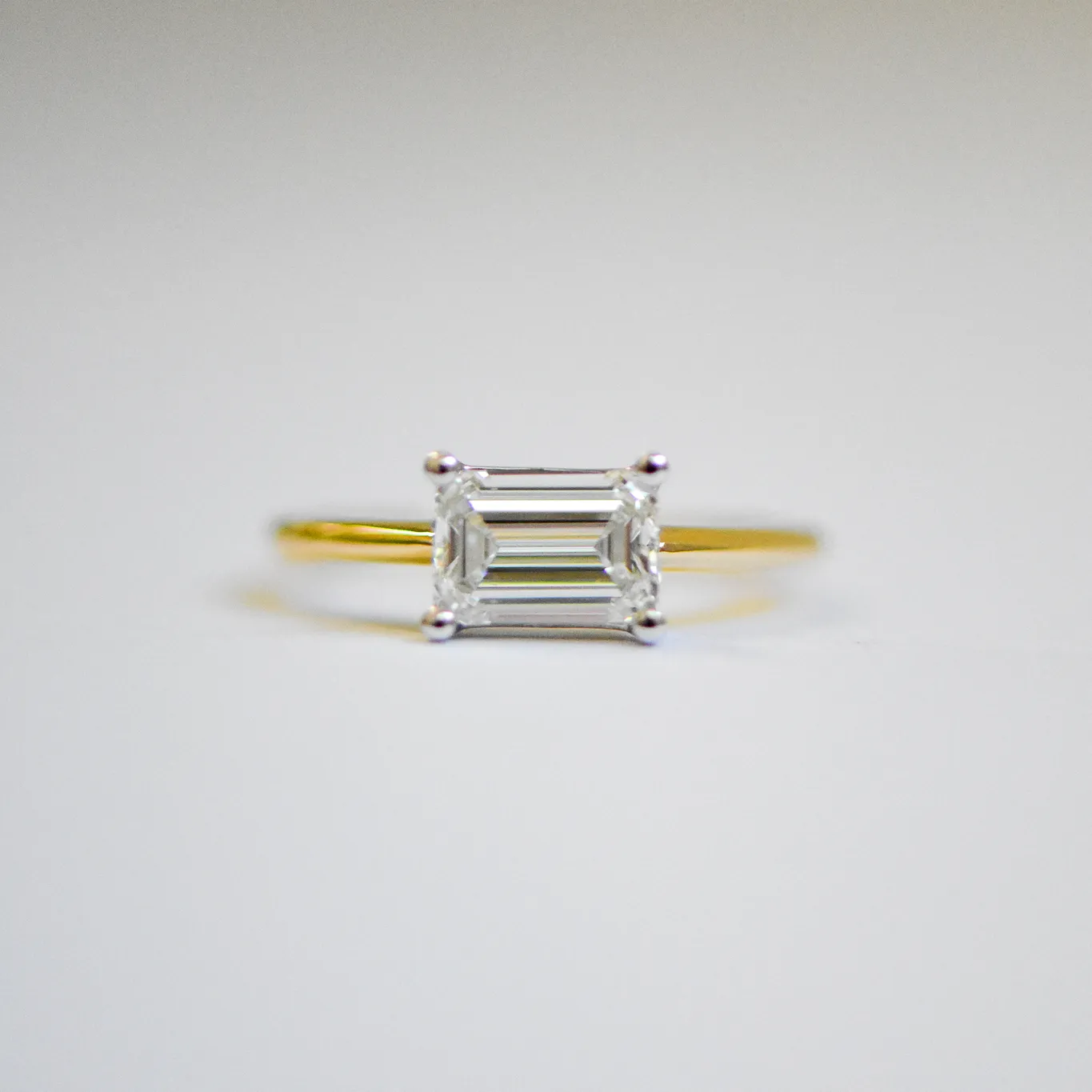Astrid | Emerald Cut Solitaire Diamond Engagement Ring | East West