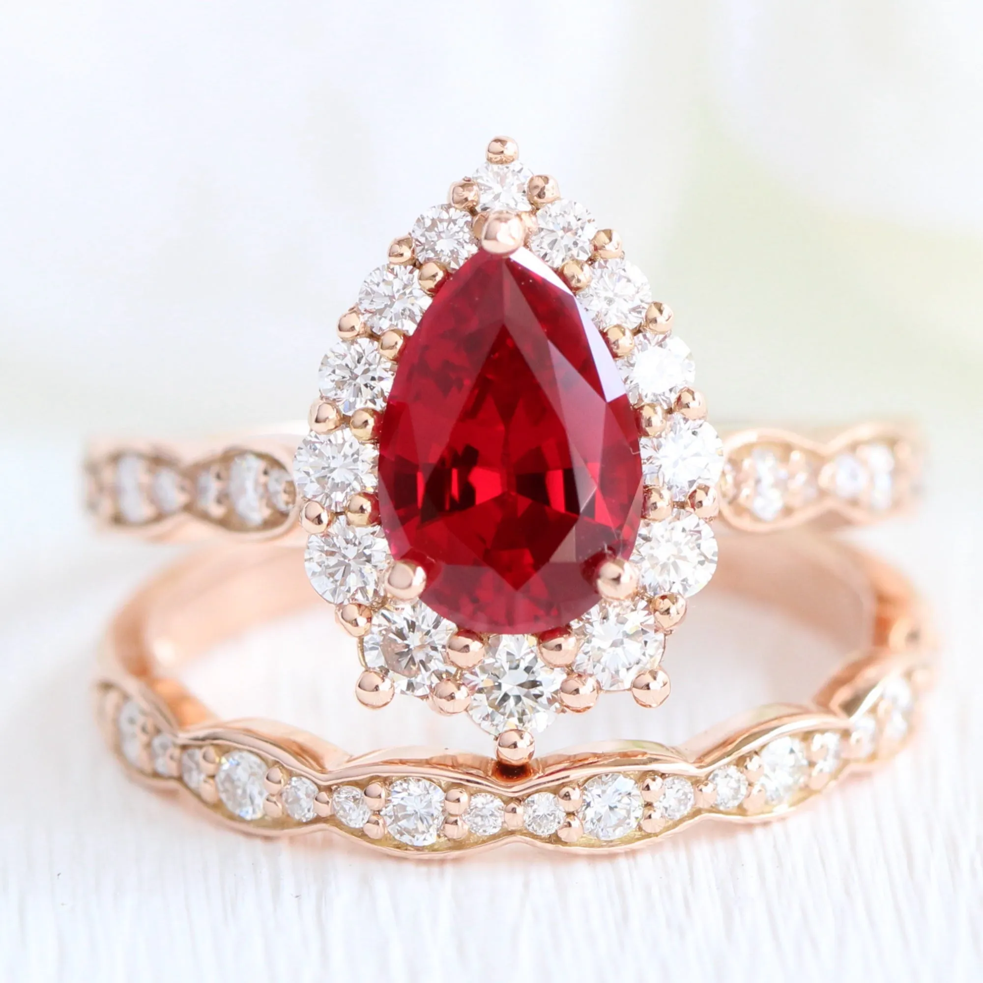 Large Pear Ruby Engagement Ring in Tiara Halo Diamond Scalloped Band